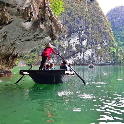 Rowing through Halong caves