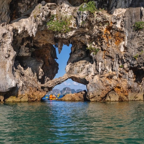 Kayaking through Luon cave in Halong bay